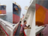 Navio de 229 metros atinge barco de pesca e vídeo mostra o momento de pânico a bordo