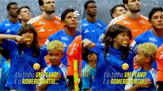 Pequena adepta rouba a cena ao morder e arrancar a cabeça de um galo de borracha no Cruzeiro Atlético Mineiro